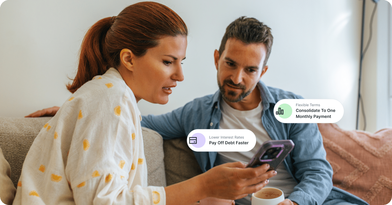Couple sitting at home on the couch discussing their debt relief options with a cash out refinance